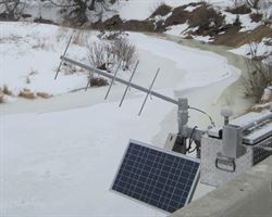 Stream gage on frozer river in North Dakota