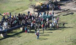 Protesters gather on pipe