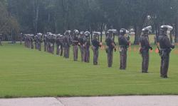 Law enforcement presence during protest at Capitol.